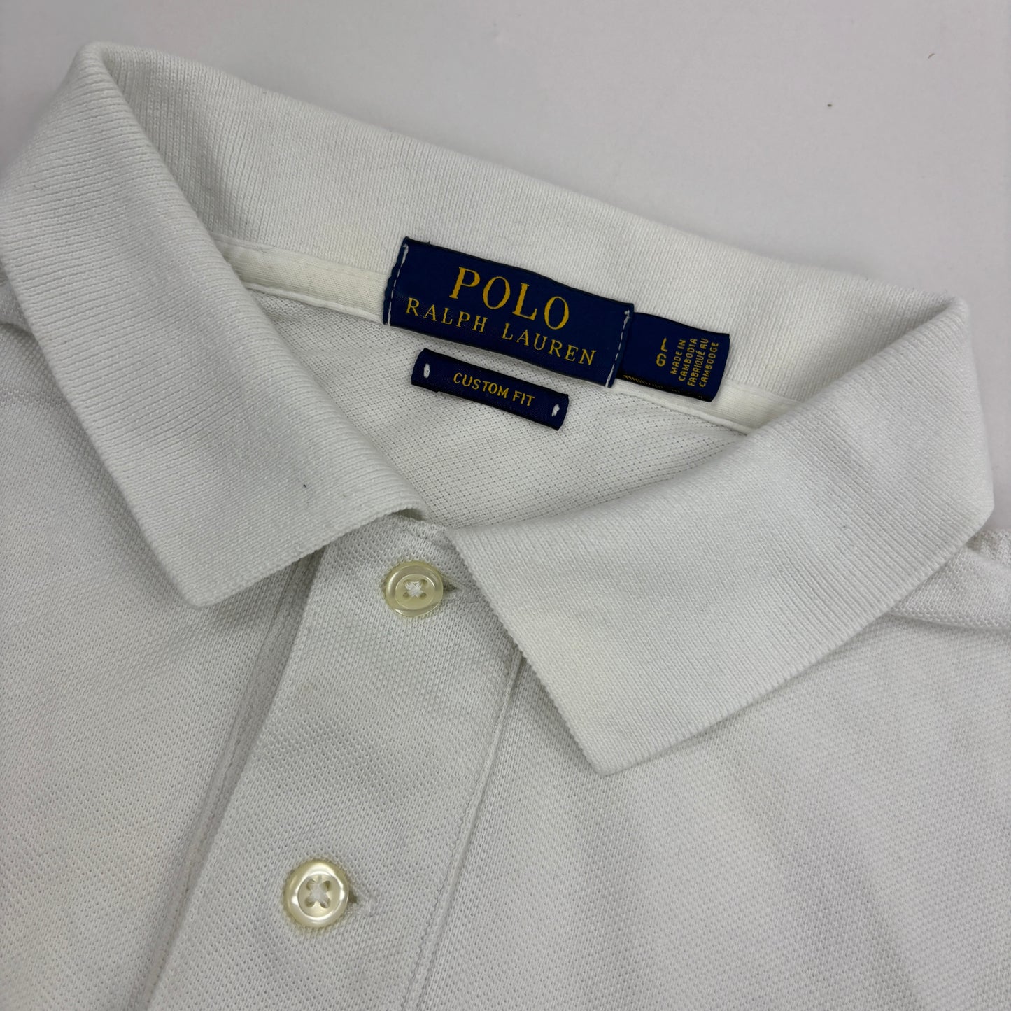 Ralph Lauren Polo (L)