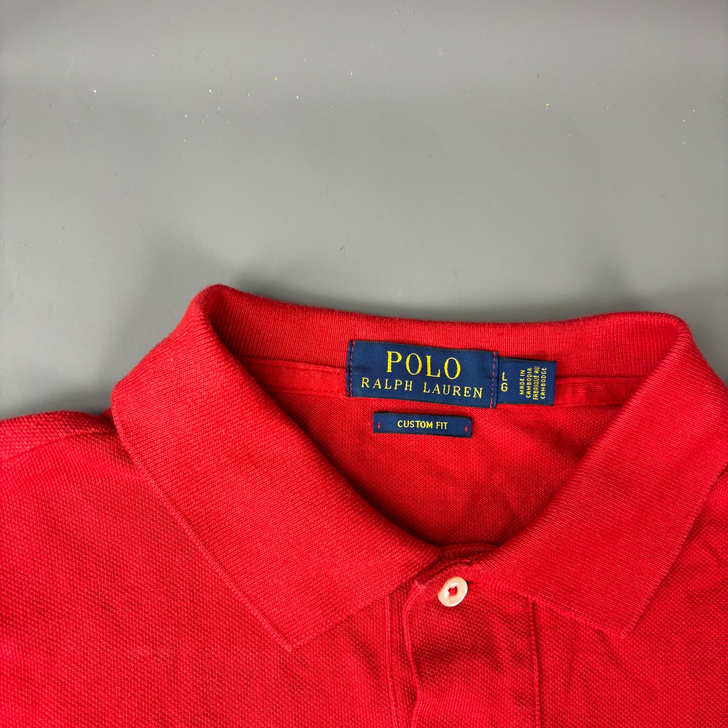 Ralph Lauren Polo (L)