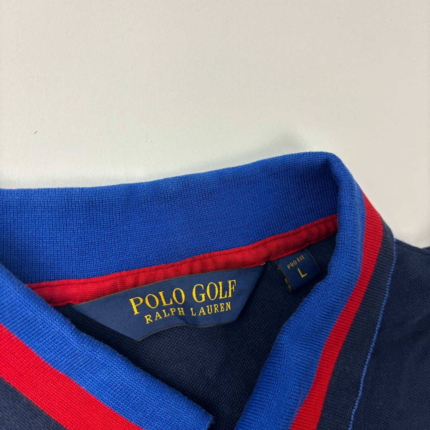 Ralph Lauren Polo (L)