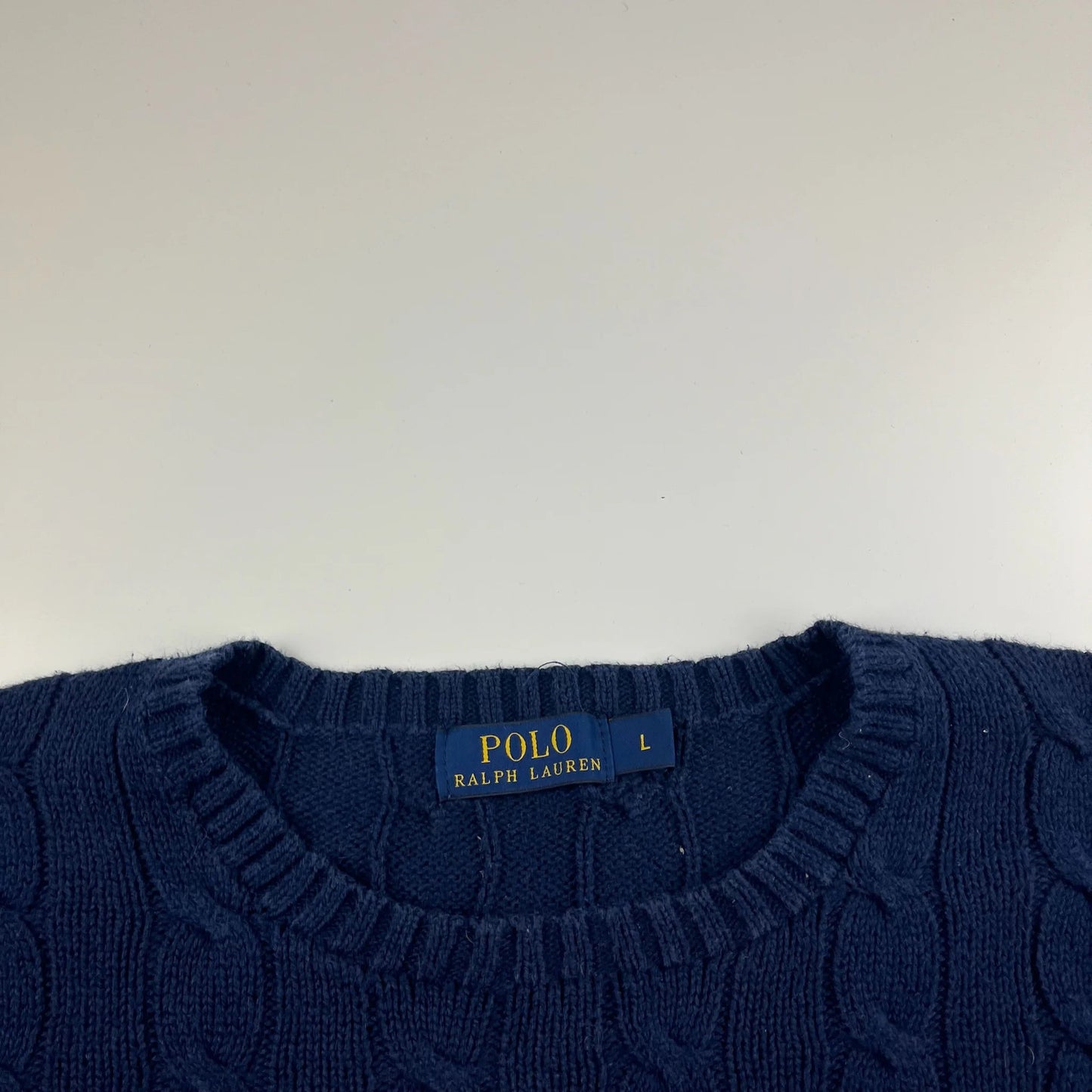 Ralph Lauren Pulli (L)