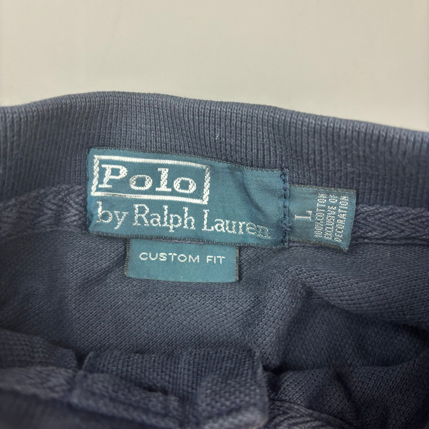 Ralph Lauren Polo (L)