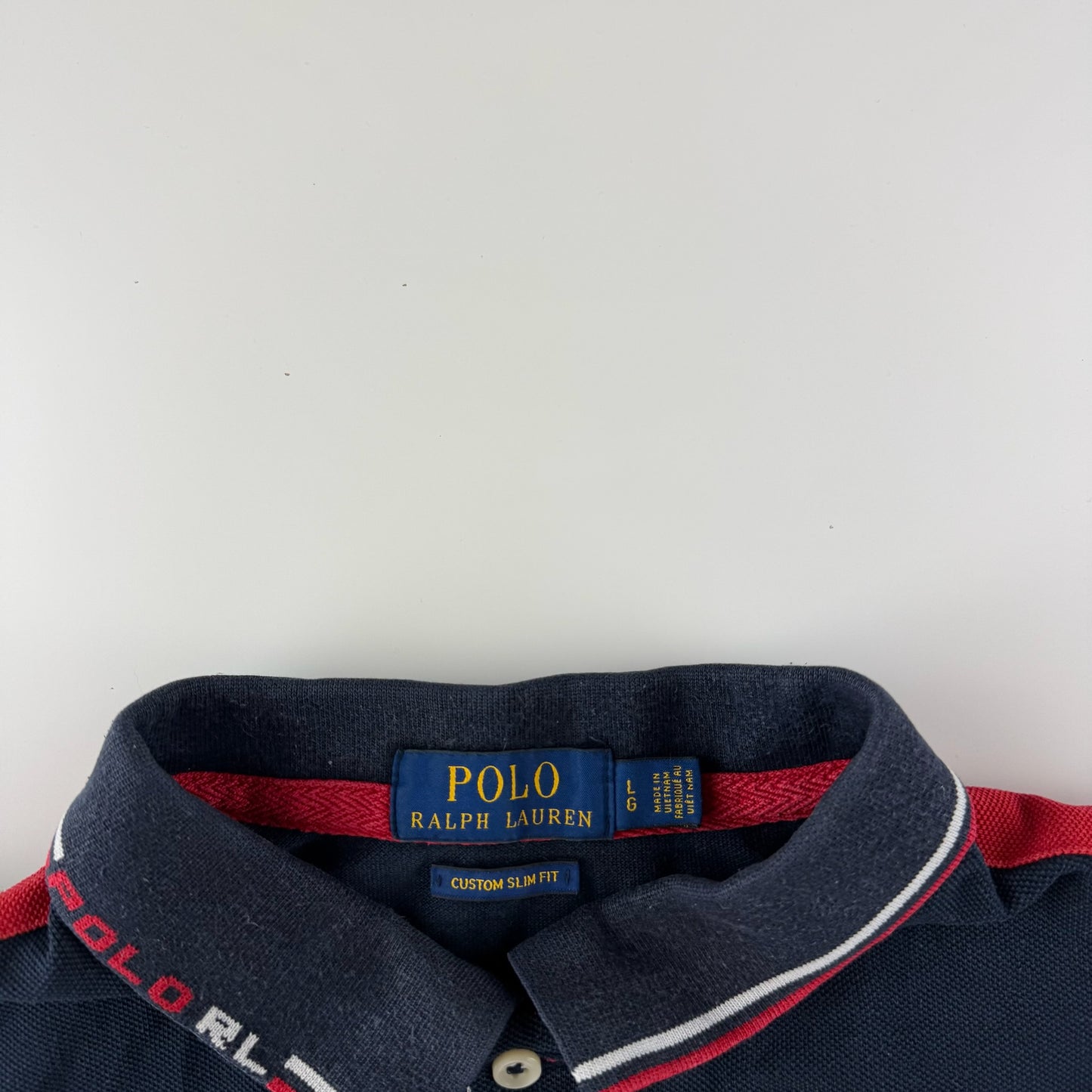 Ralph Lauren Polo (L)