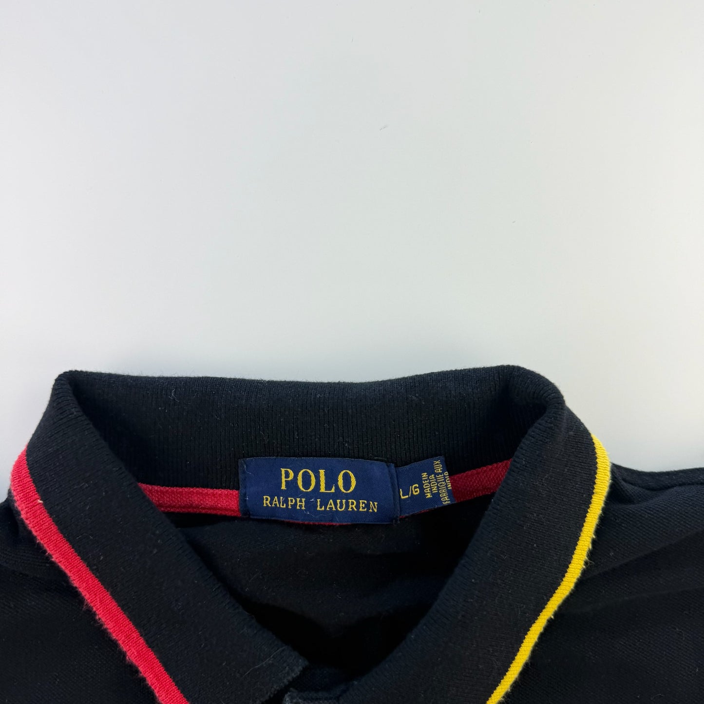 Ralph Lauren Polo (L)