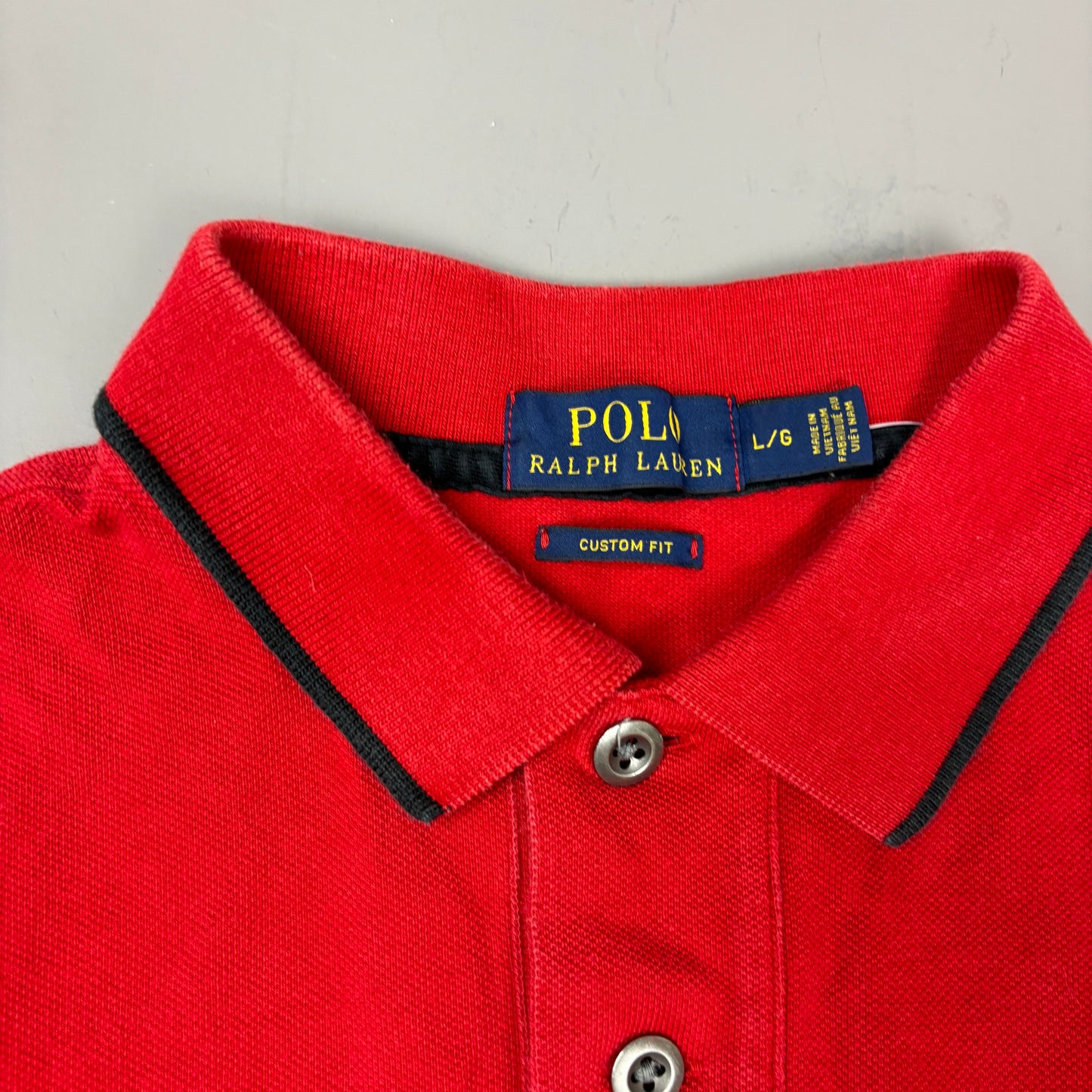 Ralph Lauren Polo (L)