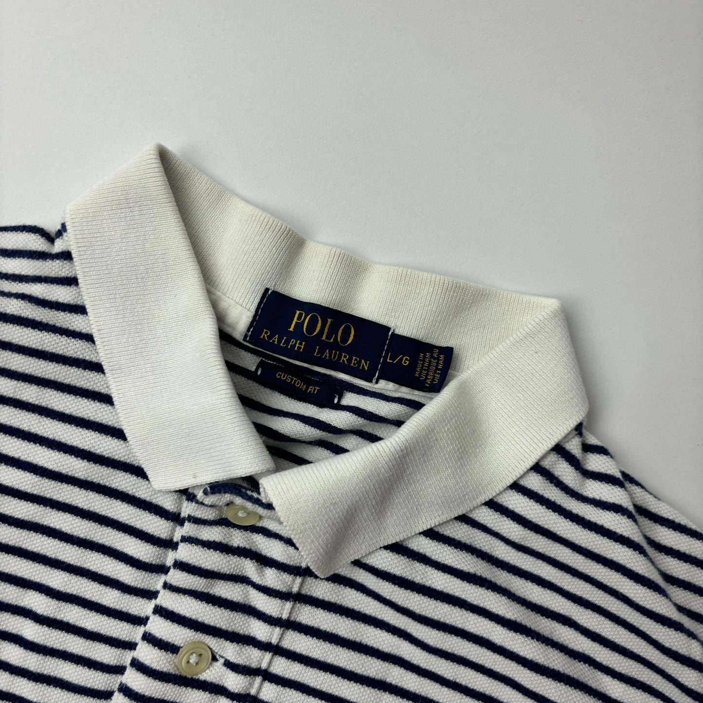 Ralph Lauren Polo (L)