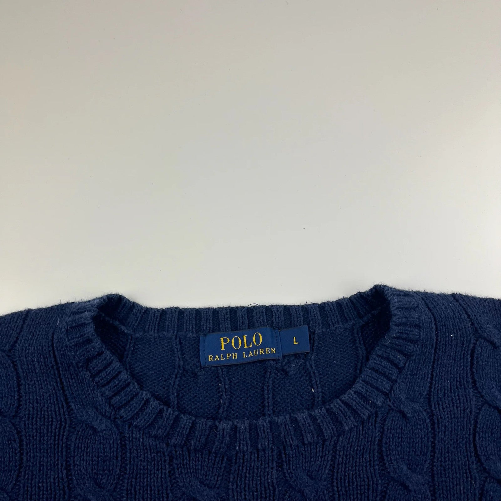 Ralph Lauren Pulli (L)